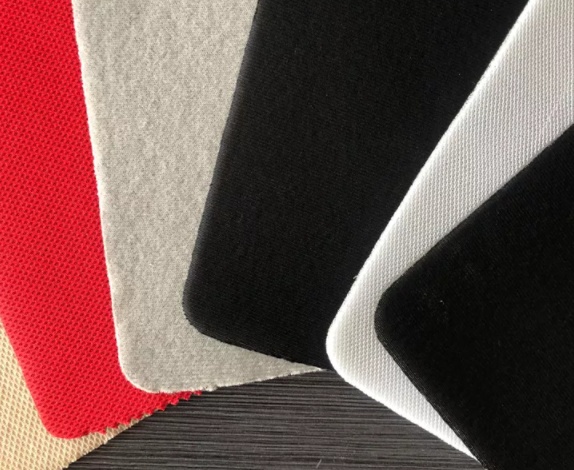 Tkanina laminowana spony